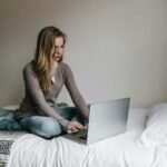 woman in her computer learning about finance