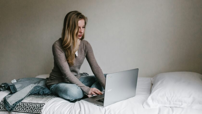 woman in her computer learning about finance