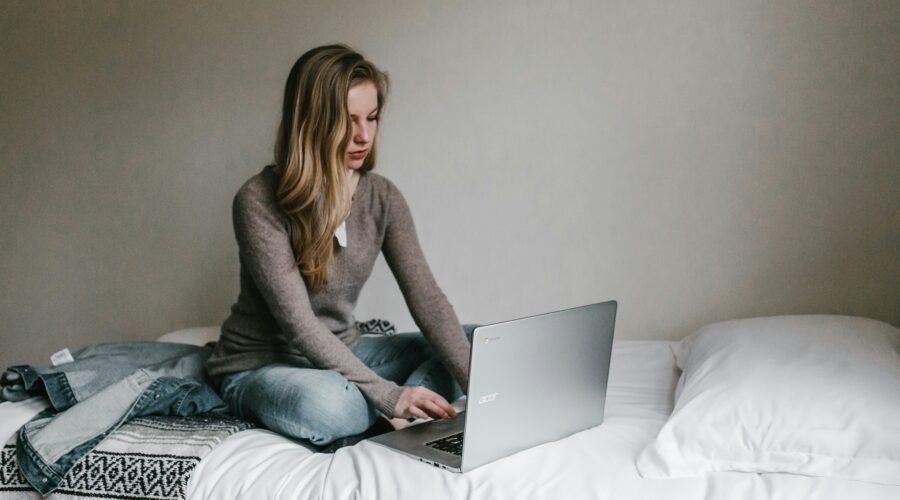 woman in her computer learning about finance